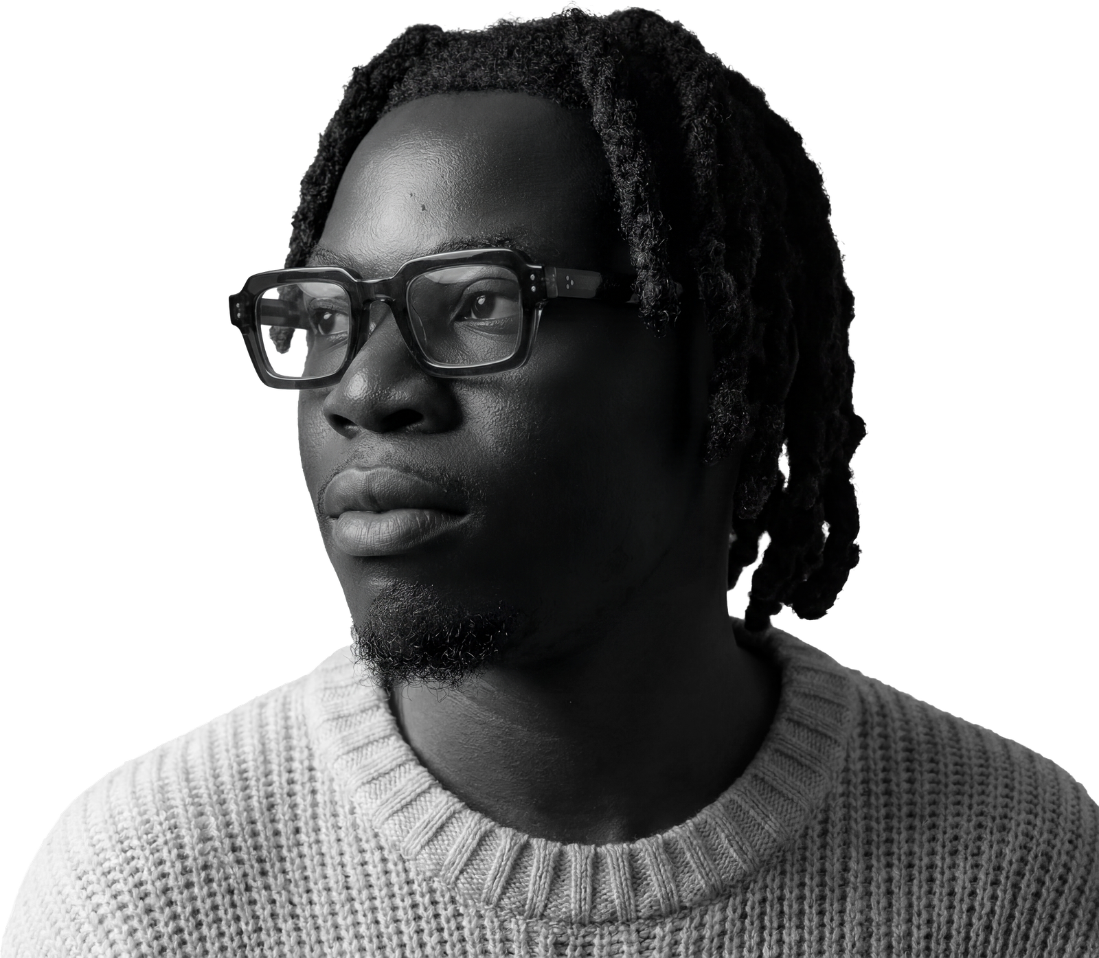 Black-and-white portrait of Nicholas Adusei Agblevor wearing glasses and a knit sweater